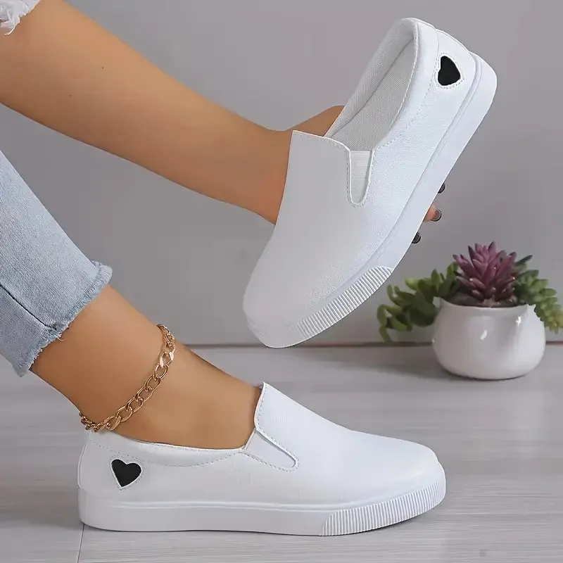 Lightweight casual flats with a soft sole and heart print